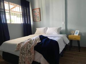 Postel nebo postele na pokoji v ubytování El Hogar del Torogoz