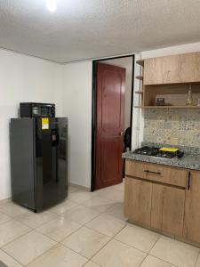 Kuchyň nebo kuchyňský kout v ubytování Bellísimos apartamentos céntricos en La Mesa