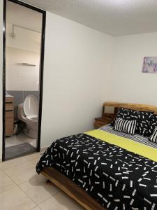 Postel nebo postele na pokoji v ubytování Bellísimos apartamentos céntricos en La Mesa