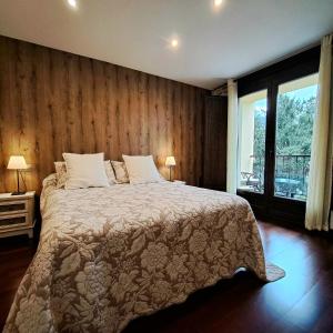 Postel nebo postele na pokoji v ubytování Apartamento con terraza al Puente Romano