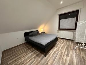 Katil atau katil-katil dalam bilik di Schöne, moderne Wohnung mit Waldblick & Parkplatz