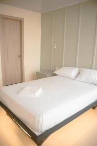 เตียงในห้องที่ Hotel Amazonas Suite , habitación sencilla