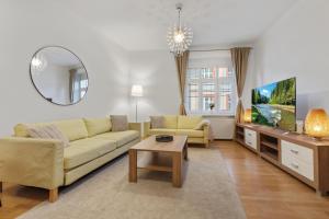 Posedenie v ubytovaní Grand Elegant Apartment
