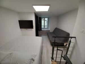 Charmant T2 duplex Centre de Foix客房内的一张或多张床位