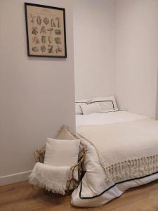 Ένα ή περισσότερα κρεβάτια σε δωμάτιο στο Collection Terreaux - No 2 Studio plein centre