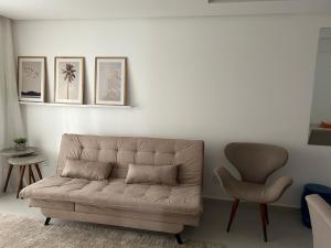 Et sittehjørne på O mais belo Apartamento a 50 metros da praia de Costa Azul