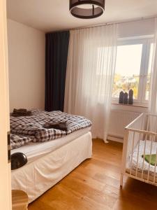 Un pat sau paturi într-o cameră la Ferienwohnung Gierse