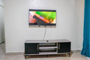 TV a/nebo společenská místnost v ubytování J&J luxury homes + 6 fotografií