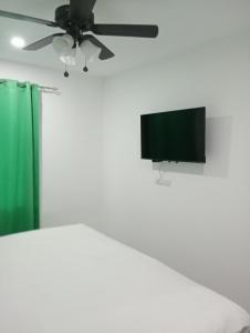 TV a/nebo společenská místnost v ubytování Matata