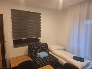 Posteľ alebo postele v izbe v ubytovaní MB APARTMÁNY LIPNO