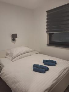 Posteľ alebo postele v izbe v ubytovaní MB APARTMÁNY LIPNO