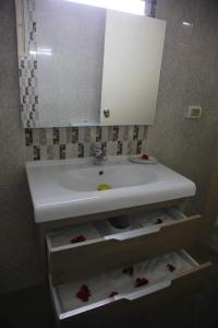 Koupelna v ubytování Hotel Amine