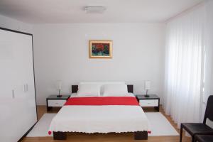 Un pat sau paturi într-o cameră la Holiday Home Pineta