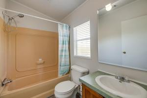 a bathroom with a toilet and a sink at 4 Mi to State Park Peaceful Rockport Home with Yard in Rockport +20 photos