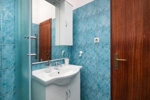 Koupelna v ubytování Apartments Miljenka + 37 fotografií