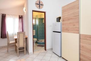 Kuchyň nebo kuchyňský kout v ubytování Apartments Miljenka