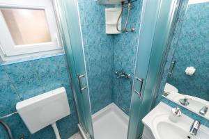 Koupelna v ubytování Apartments Miljenka