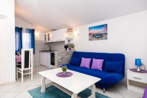 Kuchyň nebo kuchyňský kout v ubytování Apartments Miljenka