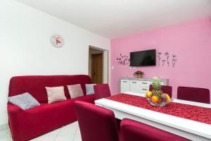 TV a/nebo společenská místnost v ubytování Apartments Miljenka