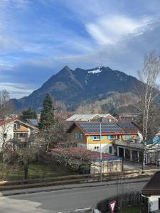 a view of a town with a mountain in the background at Grünes Stüble Allgäuer Alpen in Sonthofen