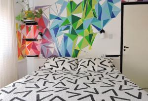 En eller flere senge i et værelse på DEPARTAMENTO MAGNET + 4 billeder