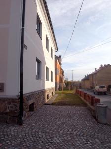 a building on the side of a street at Apartmány Pekárna in Staré Město