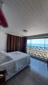 Postel nebo postele na pokoji v ubytování Paratibela Pousada