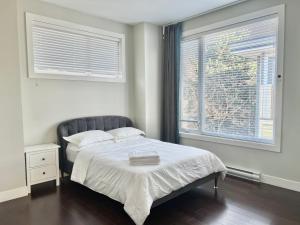 Ein Bett oder Betten in einem Zimmer der Unterkunft Spacious Home in Richmond