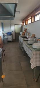 a kitchen with a table with plates on it at FANTASTICH in Viña del Mar