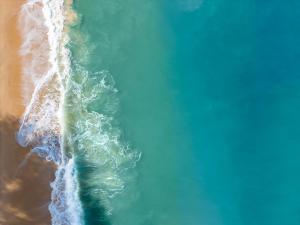 an overhead view of the ocean and the beach at Twin Villas Natai South - 5 Bedroom Luxury Beach Front Villa in Natai Beach