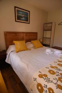 Postel nebo postele na pokoji v ubytování Departamentos Nayentao