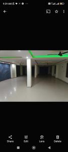a picture of a room with a green light at Shaurya Villa Guest House in Dānāpur