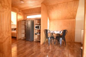 Kuchyň nebo kuchyňský kout v ubytování Departamentos Nayentao