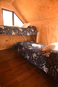 Postel nebo postele na pokoji v ubytování Departamentos Nayentao + 8 fotografií