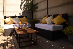 Posezení v ubytování Departamentos Nayentao