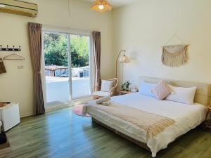 Llit o llits en una habitació de W24 Kenting Hostel II