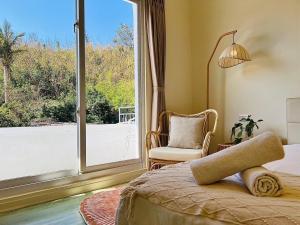 Llit o llits en una habitació de W24 Kenting Hostel II