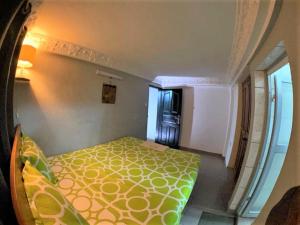 Postel nebo postele na pokoji v ubytování The Yafé Bastos 10