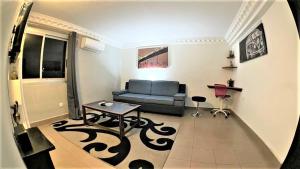 TV a/nebo společenská místnost v ubytování The Yafé Bastos 10 + 7 fotografií