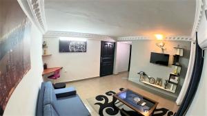 TV a/nebo společenská místnost v ubytování The Yafé Bastos 10