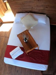 Postel nebo postele na pokoji v ubytování Ecorali Lodge