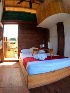Postel nebo postele na pokoji v ubytování Ecorali Lodge