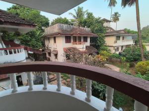 a view of a house from a balcony at J-House, spacious apartments with balconies, Thalassa 1min away in Siolim