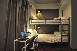 Postel nebo postele na pokoji v ubytování Tuk Tuk House 250m from MRT Sirikit