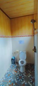 a bathroom with a toilet in a room at GreenView Backpacker INN in Ubud