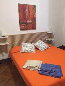 Posteľ alebo postele v izbe v ubytovaní B & B 21 Bologna