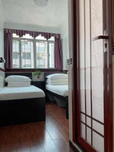 Cama o camas de una habitación en Hang Fung Hostel