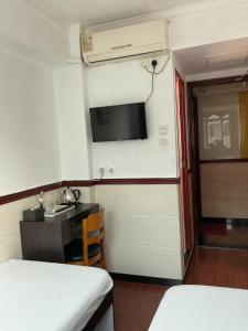 Cama o camas de una habitación en Hang Fung Hostel