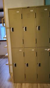 a row of lockers in a room at Terminal58hostel@town in Ban Lo Long
