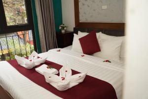 Letto o letti in una camera di NT Elysian hotel